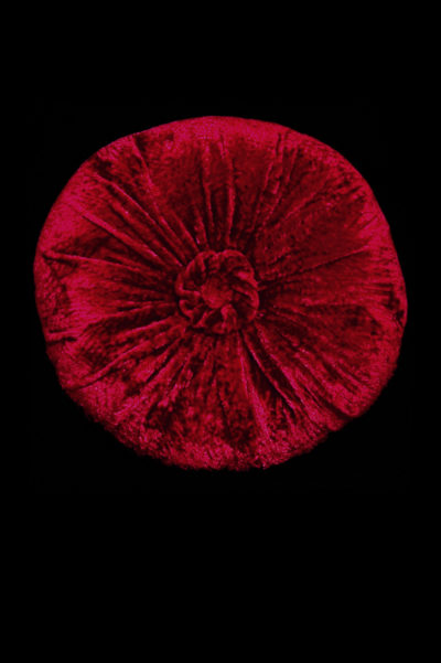 Venetia Studium furrowed velvet rounded dark red cushion
