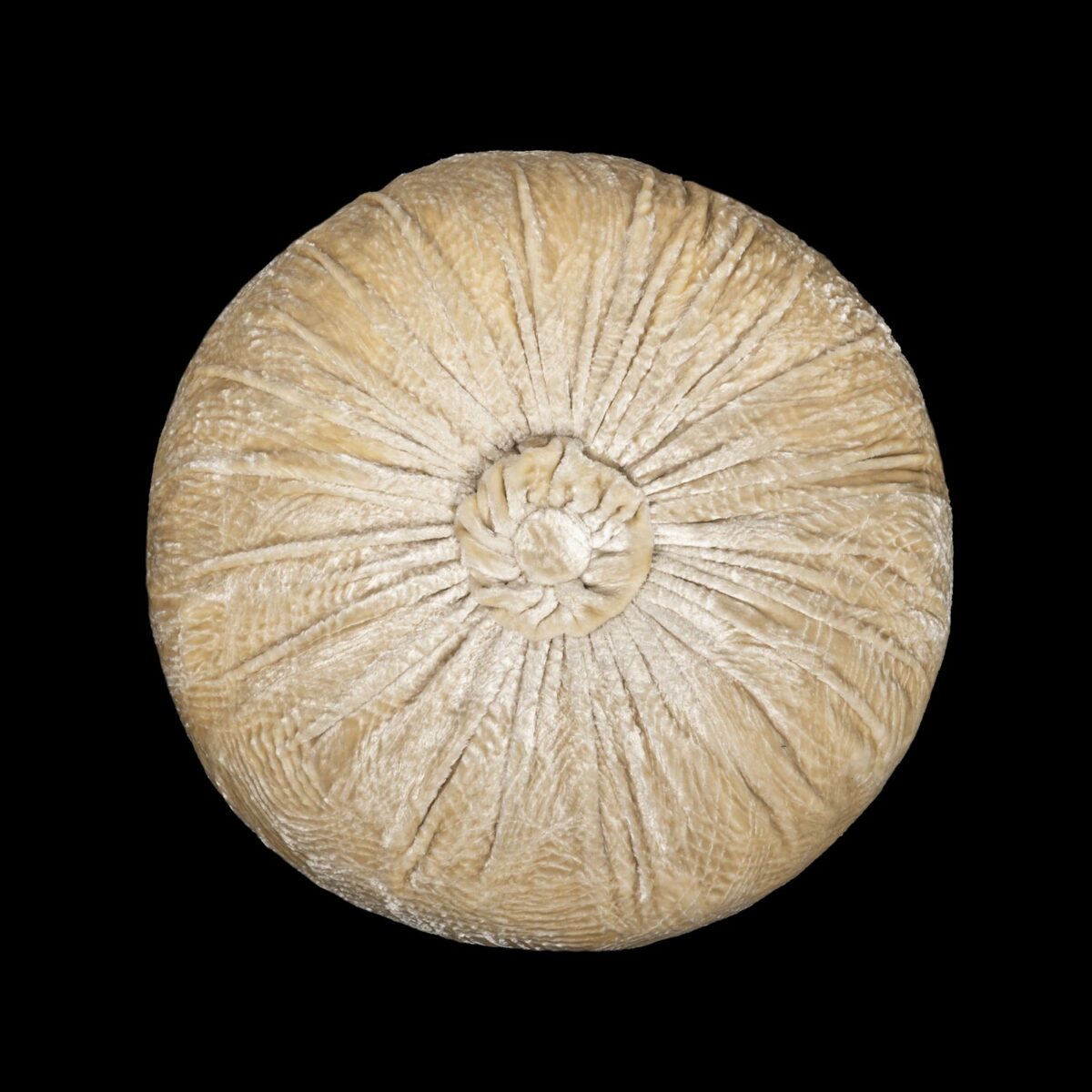 Furrowed velvet round cushion