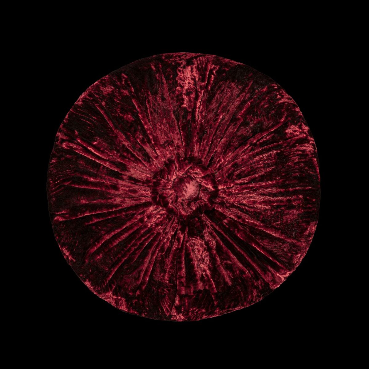 Furrowed velvet round cushion